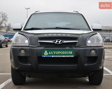Білий Хендай Туксон, об'ємом двигуна 1.98 л та пробігом 186 тис. км за 8777 $, фото 2 на Automoto.ua