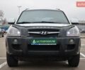 Білий Хендай Туксон, об'ємом двигуна 1.98 л та пробігом 186 тис. км за 8777 $, фото 2 на Automoto.ua
