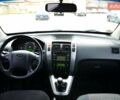 Білий Хендай Туксон, об'ємом двигуна 1.98 л та пробігом 186 тис. км за 8777 $, фото 27 на Automoto.ua