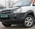 Білий Хендай Туксон, об'ємом двигуна 1.98 л та пробігом 186 тис. км за 8777 $, фото 10 на Automoto.ua