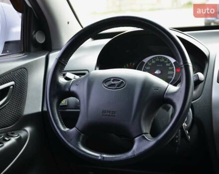 Білий Хендай Туксон, об'ємом двигуна 1.98 л та пробігом 186 тис. км за 8777 $, фото 28 на Automoto.ua