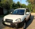 Білий Хендай Туксон, об'ємом двигуна 2 л та пробігом 136 тис. км за 11000 $, фото 3 на Automoto.ua