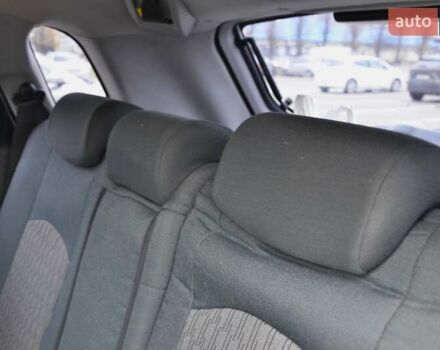 Білий Хендай Туксон, об'ємом двигуна 1.98 л та пробігом 186 тис. км за 8777 $, фото 29 на Automoto.ua