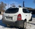 Белый Хендай Туксон, объемом двигателя 1.98 л и пробегом 268 тыс. км за 8000 $, фото 3 на Automoto.ua
