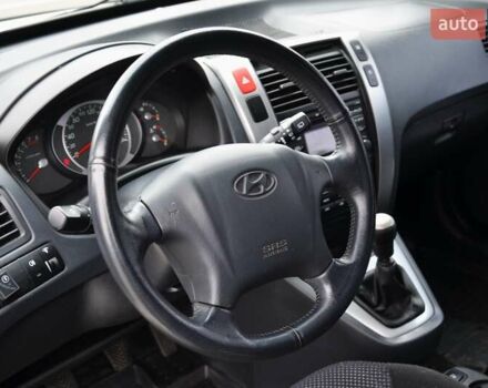 Білий Хендай Туксон, об'ємом двигуна 1.98 л та пробігом 186 тис. км за 8777 $, фото 18 на Automoto.ua