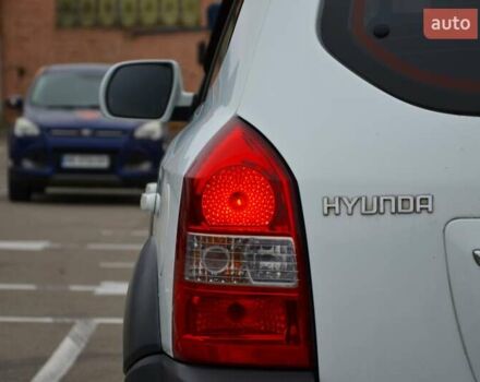 Білий Хендай Туксон, об'ємом двигуна 1.98 л та пробігом 186 тис. км за 8777 $, фото 14 на Automoto.ua