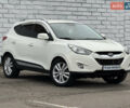 Белый Хендай Туксон, объемом двигателя 2 л и пробегом 223 тыс. км за 12500 $, фото 1 на Automoto.ua