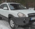 Білий Хендай Туксон, об'ємом двигуна 1.98 л та пробігом 151 тис. км за 9500 $, фото 1 на Automoto.ua