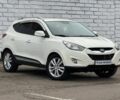 Белый Хендай Туксон, объемом двигателя 2 л и пробегом 232 тыс. км за 12200 $, фото 1 на Automoto.ua