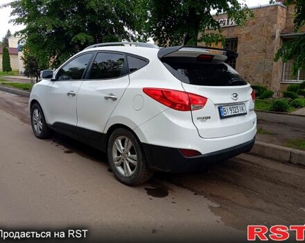 Белый Хендай Туксон, объемом двигателя 2.4 л и пробегом 87 тыс. км за 11500 $, фото 5 на Automoto.ua