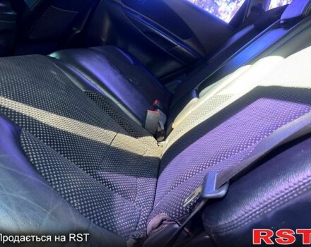 Белый Хендай Туксон, объемом двигателя 2 л и пробегом 142 тыс. км за 10280 $, фото 8 на Automoto.ua