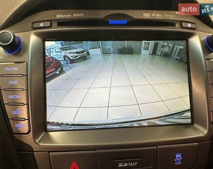 Белый Хендай Туксон, объемом двигателя 2 л и пробегом 150 тыс. км за 14500 $, фото 14 на Automoto.ua