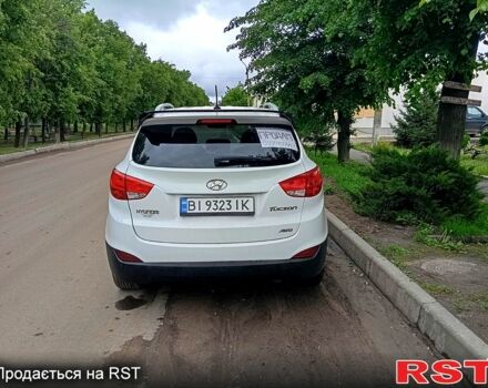Белый Хендай Туксон, объемом двигателя 2.4 л и пробегом 87 тыс. км за 11500 $, фото 4 на Automoto.ua
