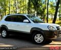 Белый Хендай Туксон, объемом двигателя 2 л и пробегом 142 тыс. км за 10280 $, фото 1 на Automoto.ua