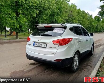 Белый Хендай Туксон, объемом двигателя 2.4 л и пробегом 87 тыс. км за 11500 $, фото 7 на Automoto.ua
