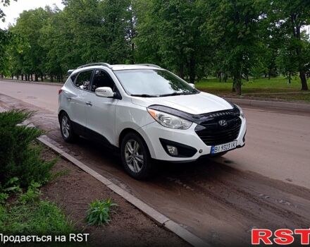 Белый Хендай Туксон, объемом двигателя 2.4 л и пробегом 87 тыс. км за 11500 $, фото 3 на Automoto.ua