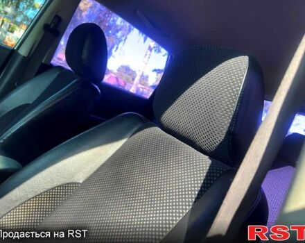 Белый Хендай Туксон, объемом двигателя 2 л и пробегом 142 тыс. км за 10280 $, фото 5 на Automoto.ua