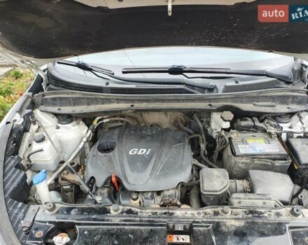 Білий Хендай Туксон, об'ємом двигуна 2.36 л та пробігом 152 тис. км за 9800 $, фото 12 на Automoto.ua