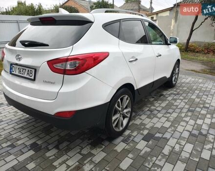 Білий Хендай Туксон, об'ємом двигуна 2.36 л та пробігом 152 тис. км за 9800 $, фото 3 на Automoto.ua