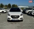 Белый Хендай Туксон, объемом двигателя 2 л и пробегом 156 тыс. км за 16400 $, фото 1 на Automoto.ua