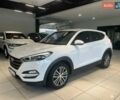 Белый Хендай Туксон, объемом двигателя 2 л и пробегом 152 тыс. км за 18800 $, фото 1 на Automoto.ua
