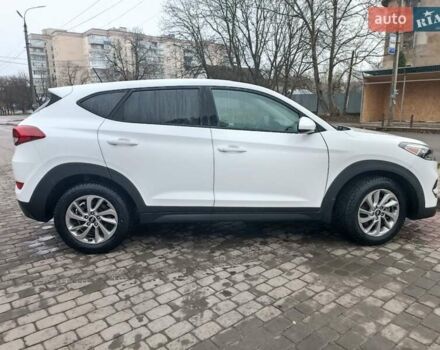 Білий Хендай Туксон, об'ємом двигуна 2 л та пробігом 97 тис. км за 14200 $, фото 6 на Automoto.ua