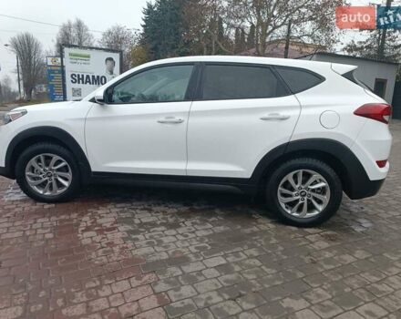 Білий Хендай Туксон, об'ємом двигуна 2 л та пробігом 97 тис. км за 14200 $, фото 5 на Automoto.ua