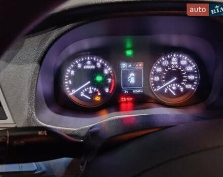 Білий Хендай Туксон, об'ємом двигуна 2 л та пробігом 97 тис. км за 14200 $, фото 13 на Automoto.ua