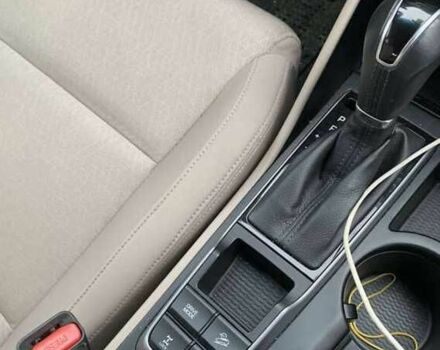 Белый Хендай Туксон, объемом двигателя 1.6 л и пробегом 122 тыс. км за 9700 $, фото 4 на Automoto.ua