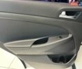 Белый Хендай Туксон, объемом двигателя 2 л и пробегом 152 тыс. км за 18800 $, фото 20 на Automoto.ua