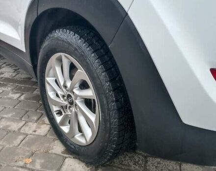 Білий Хендай Туксон, об'ємом двигуна 2 л та пробігом 97 тис. км за 14200 $, фото 11 на Automoto.ua