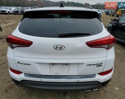 Белый Хендай Туксон, объемом двигателя 1.6 л и пробегом 137 тыс. км за 3000 $, фото 5 на Automoto.ua