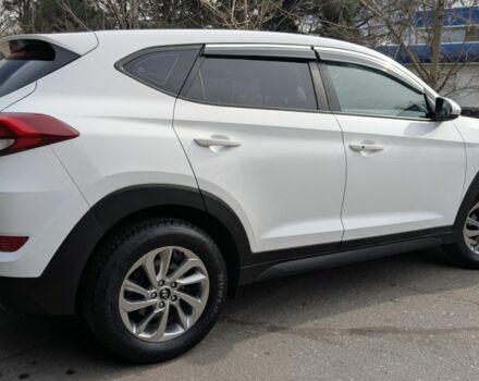 Белый Хендай Туксон, объемом двигателя 2 л и пробегом 203 тыс. км за 16500 $, фото 3 на Automoto.ua