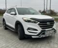 Белый Хендай Туксон, объемом двигателя 1.6 л и пробегом 156 тыс. км за 16000 $, фото 2 на Automoto.ua