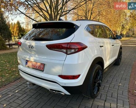 Білий Хендай Туксон, об'ємом двигуна 2 л та пробігом 148 тис. км за 22500 $, фото 11 на Automoto.ua