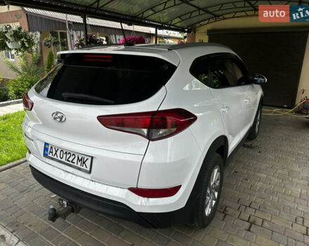 Білий Хендай Туксон, об'ємом двигуна 2 л та пробігом 140 тис. км за 16500 $, фото 9 на Automoto.ua