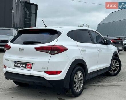 Белый Хендай Туксон, объемом двигателя 2 л и пробегом 147 тыс. км за 18740 $, фото 8 на Automoto.ua