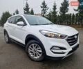 Белый Хендай Туксон, объемом двигателя 2 л и пробегом 140 тыс. км за 9800 $, фото 1 на Automoto.ua
