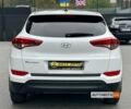 Білий Хендай Туксон, об'ємом двигуна 2 л та пробігом 120 тис. км за 14990 $, фото 4 на Automoto.ua