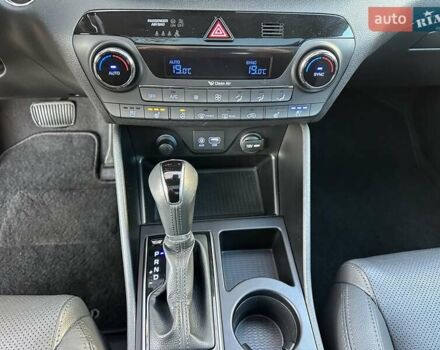 Білий Хендай Туксон, об'ємом двигуна 2 л та пробігом 148 тис. км за 22500 $, фото 27 на Automoto.ua