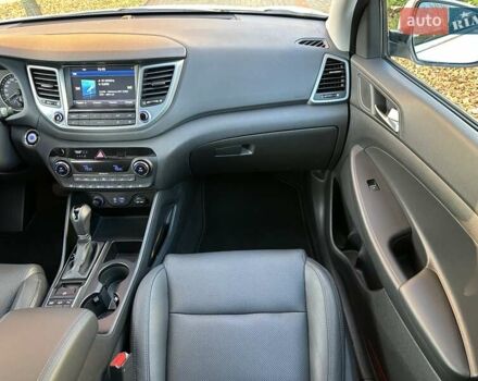 Білий Хендай Туксон, об'ємом двигуна 2 л та пробігом 148 тис. км за 22500 $, фото 19 на Automoto.ua