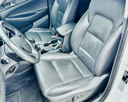 Белый Хендай Туксон, объемом двигателя 2 л и пробегом 173 тыс. км за 17200 $, фото 14 на Automoto.ua