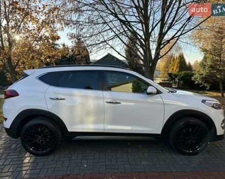 Білий Хендай Туксон, об'ємом двигуна 2 л та пробігом 148 тис. км за 22500 $, фото 9 на Automoto.ua
