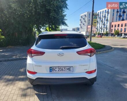 Білий Хендай Туксон, об'ємом двигуна 2 л та пробігом 185 тис. км за 13700 $, фото 4 на Automoto.ua