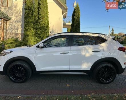 Білий Хендай Туксон, об'ємом двигуна 2 л та пробігом 148 тис. км за 22500 $, фото 4 на Automoto.ua
