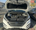 Белый Хендай Туксон, объемом двигателя 2 л и пробегом 103 тыс. км за 15800 $, фото 4 на Automoto.ua