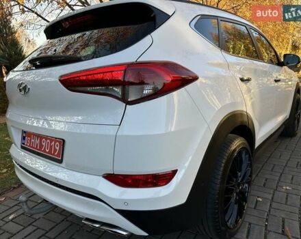Білий Хендай Туксон, об'ємом двигуна 2 л та пробігом 148 тис. км за 22500 $, фото 81 на Automoto.ua