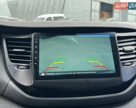 Белый Хендай Туксон, объемом двигателя 2 л и пробегом 147 тыс. км за 18740 $, фото 28 на Automoto.ua