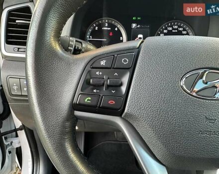 Білий Хендай Туксон, об'ємом двигуна 2 л та пробігом 148 тис. км за 22500 $, фото 33 на Automoto.ua