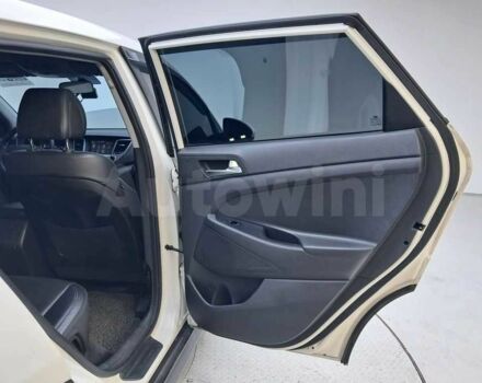 Белый Хендай Туксон, объемом двигателя 2 л и пробегом 157 тыс. км за 15500 $, фото 18 на Automoto.ua